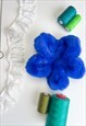 BLUE FAUX FUR OVERSIZE FLOWER SCRUNCHIE