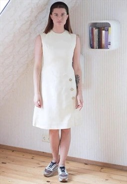 Cream heavy sleeveless vintage dress