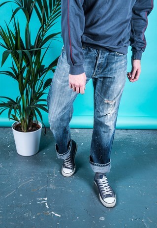 VINTAGE LEVI'S 501 JEANS IN BLUE WITH RIPS AND PAINT MARKS