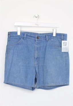 Vintage Levi's shorts in blue. Best fits W34"