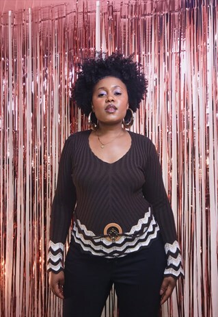 70S STYLED RIBBED JUMPER WITH PEACE BUCKLE