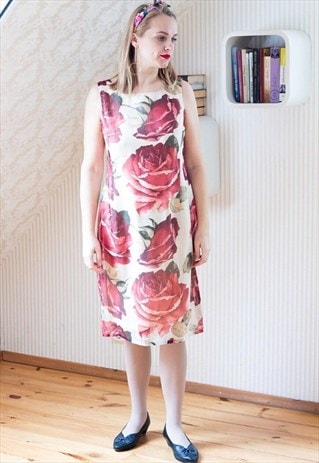 Sleeveless cream dress with big roses