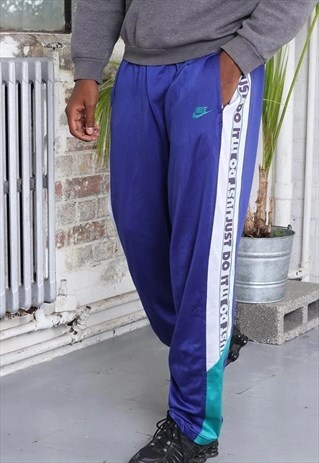 VINTAGE NIKE TAPE LOGO TRACKSUIT TROUSERS PURPLE