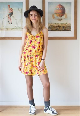 Bright yellow floral sleeveless playsuit