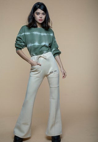 BEIGE FLARED TRACK PANTS