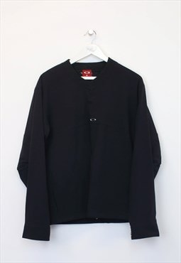 Vintage Oakley jacket in black. Best fits M