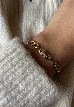 Authentic Dior clasp Pendant- on Bracelet
