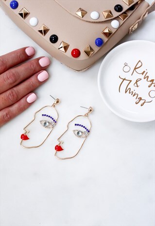 GOLD FACE LIPS EYES DIAMANTE CUT OUT DROP DANGLE EARRINGS