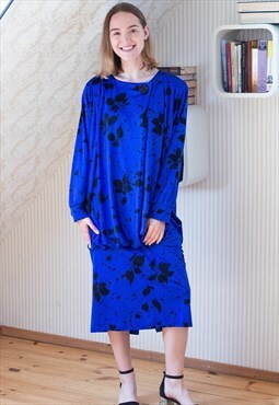 Bright blue long sleeve dress with black flowers