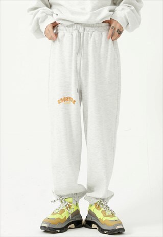 KALODIS LETTERS PATTERNED STRAIGHT LEG TROUSERS