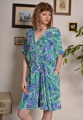 VINTAGE 80S TROPICAL FLORAL PRINT WAISTED PLAYSUIT IN BLUE