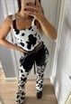 HANDMADE COW PRINT VELBOA CUT OUT FLARED TROUSERS
