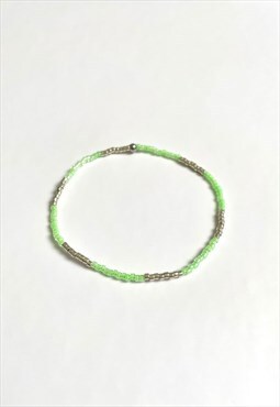 Neon green and silver elastic bracelet. Handmade item.