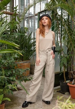 Tie waist pants in elongated silhouette from soft linen 