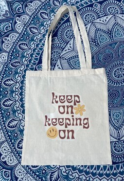 'keep on keeping on' printed tote bag 