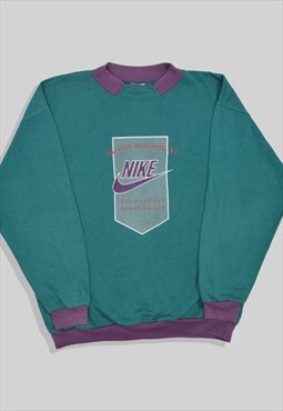 Vintage 1980s Nike Spellout Logo Sweatshirt in Turquoise