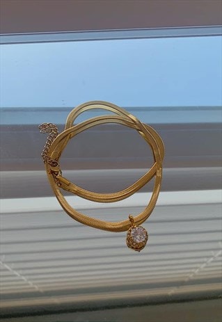 LUNAE. GOLD CLEAR CRYSTAL SNAKE HERRINGBONE CHAIN NECKLACE
