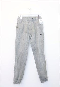 Vintage Nike joggers in grey. Best fits L