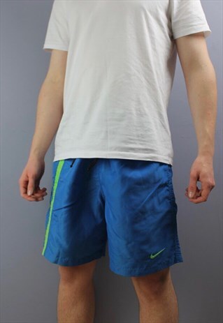 VINTAGE NIKE SHORTS IN BLUE WITH EMBROIDERED LOGO, POCKETS,